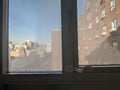 Cold room interior looking out onto water condensation formed on interior windows during early winter. Condensation is known to Royalty Free Stock Photo