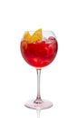 Cold sangria in a wine glass isolated on white Royalty Free Stock Photo