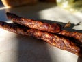 Cold-smoked cured pork and beef sausage