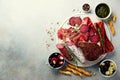 Cold smoked meat plate. Traditional italian antipasto, cutting board with salami, prosciutto, ham, pork chops, olives on Royalty Free Stock Photo