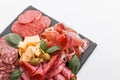 Cold smoked meat plate on a white background Royalty Free Stock Photo