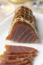 Cold smoked tuna fish and slices close up