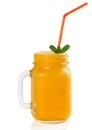 Cold smoothie from orange fruit. Royalty Free Stock Photo