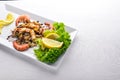 Cold snacks. Seafood, shrimp,  On a wooden background. Top view. Free space Royalty Free Stock Photo