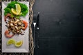 Cold snacks. Seafood, shrimp,  On a wooden background. Royalty Free Stock Photo