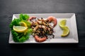 Cold snacks. Seafood, shrimp, wooden background. Top view. Free space Royalty Free Stock Photo