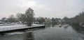 A cold snow covered winters day at the river Ouse at St Neots Cambridgeshire