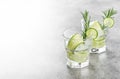 Cold summer beverage Fresh drink cucumber ice rosemary herb Royalty Free Stock Photo