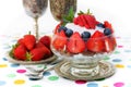 Cold summer layered dessert of sweet cream cheese, strawberries and blueberries Royalty Free Stock Photo