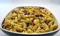 Cold summer salad, fusilli italian pasta, pasta fredda, in white bowl Royalty Free Stock Photo