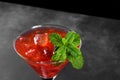 Cold summer strawberry cocktail mojito, margarita, daiquiri in a martini glass on dark background, close up Royalty Free Stock Photo