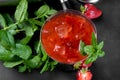 Cold summer strawberry cocktail mojito, margarita, daiquiri in a martini glass on dark background, close up Royalty Free Stock Photo