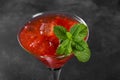 Cold summer strawberry cocktail mojito, margarita, daiquiri in a martini glasse on dark background, close up Royalty Free Stock Photo