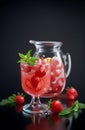 Cold summer strawberry kvass with mint in a glass