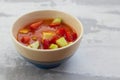 Cold tomato soup gaspacho with bread in white bowl on ceramic background Royalty Free Stock Photo