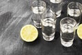 Cold vodka in shot glasses on a black background Royalty Free Stock Photo