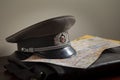 Cold War officer cap on brief case