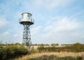 Cold War steel British military lookout tower with glass windows based at decommissioned abandoned old nuclear weapons site