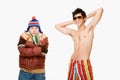 Cold and warm young men Royalty Free Stock Photo