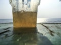 Cold water with ice cubes in plastic glass, Water drops, Close up & Macro shot, Selective focus, Healthy Drink concept Royalty Free Stock Photo