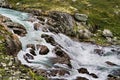 Cold water slashing through rocks Royalty Free Stock Photo