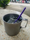 The Cold water in a stainless steel drinking glass cool. Royalty Free Stock Photo