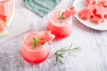 Cold watermelon drink in glasses on the table. Summer refreshing cocktails Royalty Free Stock Photo