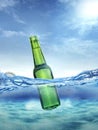 Cold wet open beer bottle with smoke floating in the ocean Royalty Free Stock Photo