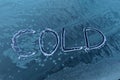 Cold written on frozen car window Royalty Free Stock Photo