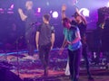 Coldplay Band Members Bow at End of Concert