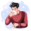 Colds, seasonal flu. A guy with a runny nose blows his nose into a tissue