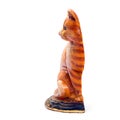 Colered antique figurine of a cat. Royalty Free Stock Photo