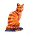 Colered antique figurine of a cat. Royalty Free Stock Photo