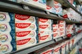 Colgate toothpaste boxes displayed on store shelf. Royalty Free Stock Photo
