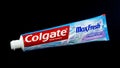 Colgate toothpaste isolated on black background. Royalty Free Stock Photo