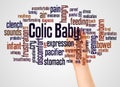 Colic baby word cloud and hand with marker concept