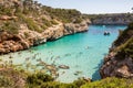 Coll Baix beach in Alcudia bay in Mallorca Balearic islands of Spain. Tropical paradise beach.Summer vacation travel holiday backg Royalty Free Stock Photo