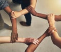 Collaboration, arms in a circle and business people in the office from above for support or community. Teamwork, trust Royalty Free Stock Photo