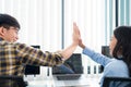 Collaboration Business Team success concept a businessman and a businesswoman giving high five as a team together before starting Royalty Free Stock Photo