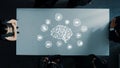 Collaborative Business Meeting with Brain Network Concept on Modern Table, Emphasizing Technology and Connectivity in a Royalty Free Stock Photo