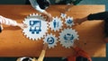 Collaborative Business Strategy Session with Hands on Gears Representing Management, Team Building, Planning, and Growth Royalty Free Stock Photo