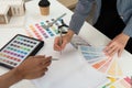 Collaborative Design Session with Color Palettes and Planning Royalty Free Stock Photo