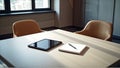 Round office table with notebooks and modern chairs Royalty Free Stock Photo