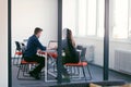 Collaborative process of multicultural skilled young business team during brainstorming meeting in office.Diverse group Royalty Free Stock Photo