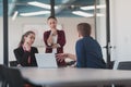 Collaborative process of multicultural skilled young business team during brainstorming meeting in office.Diverse group Royalty Free Stock Photo