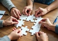 Collaborative Puzzle Solving: Teamwork in Action Royalty Free Stock Photo