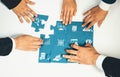 Collaborative Teamwork for Data Analysis and Problem Solving with Puzzle Pieces Representing Business Insights and Royalty Free Stock Photo