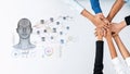 Collaborative Teamwork with Hands Stacked Above a Digital Brain Illustration Representing Innovation and Technology Royalty Free Stock Photo