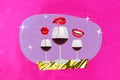 Collage artwork picture of pouted plump lips drinking red whine isolated creative neon pink color background