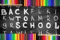 Collage of Back to school background with title Back to school written by white chalk on the black chalkboard with a lot Royalty Free Stock Photo